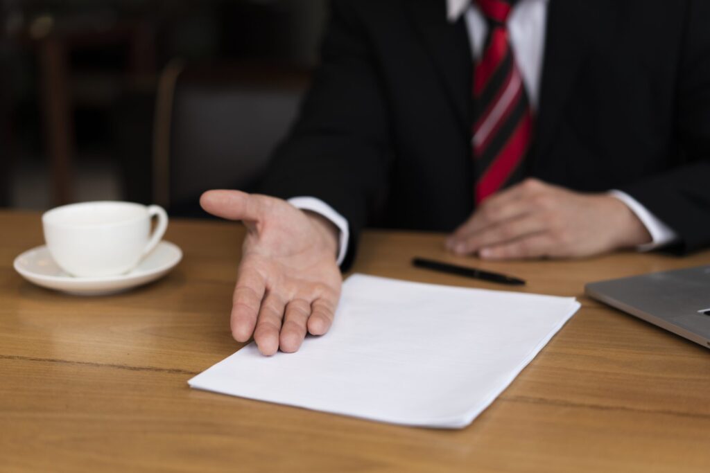 Lawyer showing claim document to a worker